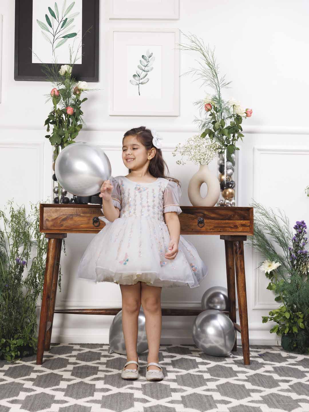 Phillipa white organza dress with hand embroidery of flower and butterflies detailing