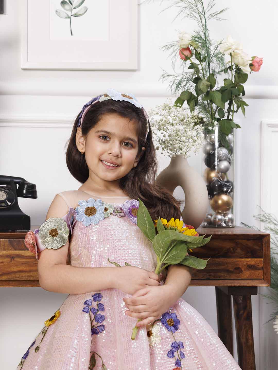 Lily pink sequin panel gown with flower detailing