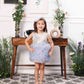 Aida ruffled pink and blue dress with flower and feathers detailing