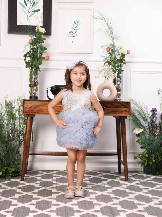 Aida ruffled pink and blue dress with flower and feathers detailing