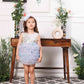 Aida ruffled pink and blue dress with flower and feathers detailing