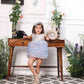 Aida ruffled pink and blue dress with flower and feathers detailing