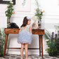 Aida ruffled pink and blue dress with flower and feathers detailing