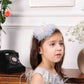 Aida ruffled pink and blue dress with flower and feathers detailing