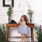 Aida ruffled pink and blue dress with flower and feathers detailing