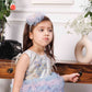 Aida ruffled pink and blue dress with flower and feathers detailing