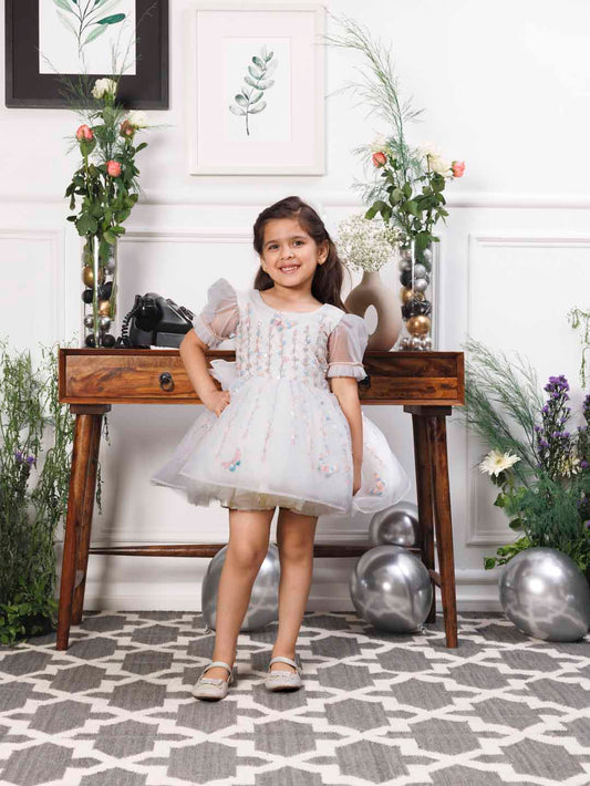 Phillipa white organza dress with hand embroidery of flower and butterflies detailing