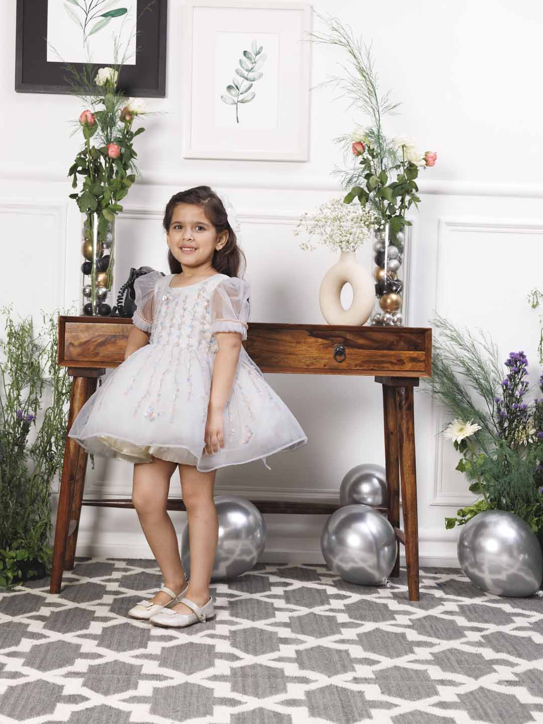 Phillipa white organza dress with hand embroidery of flower and butterflies detailing