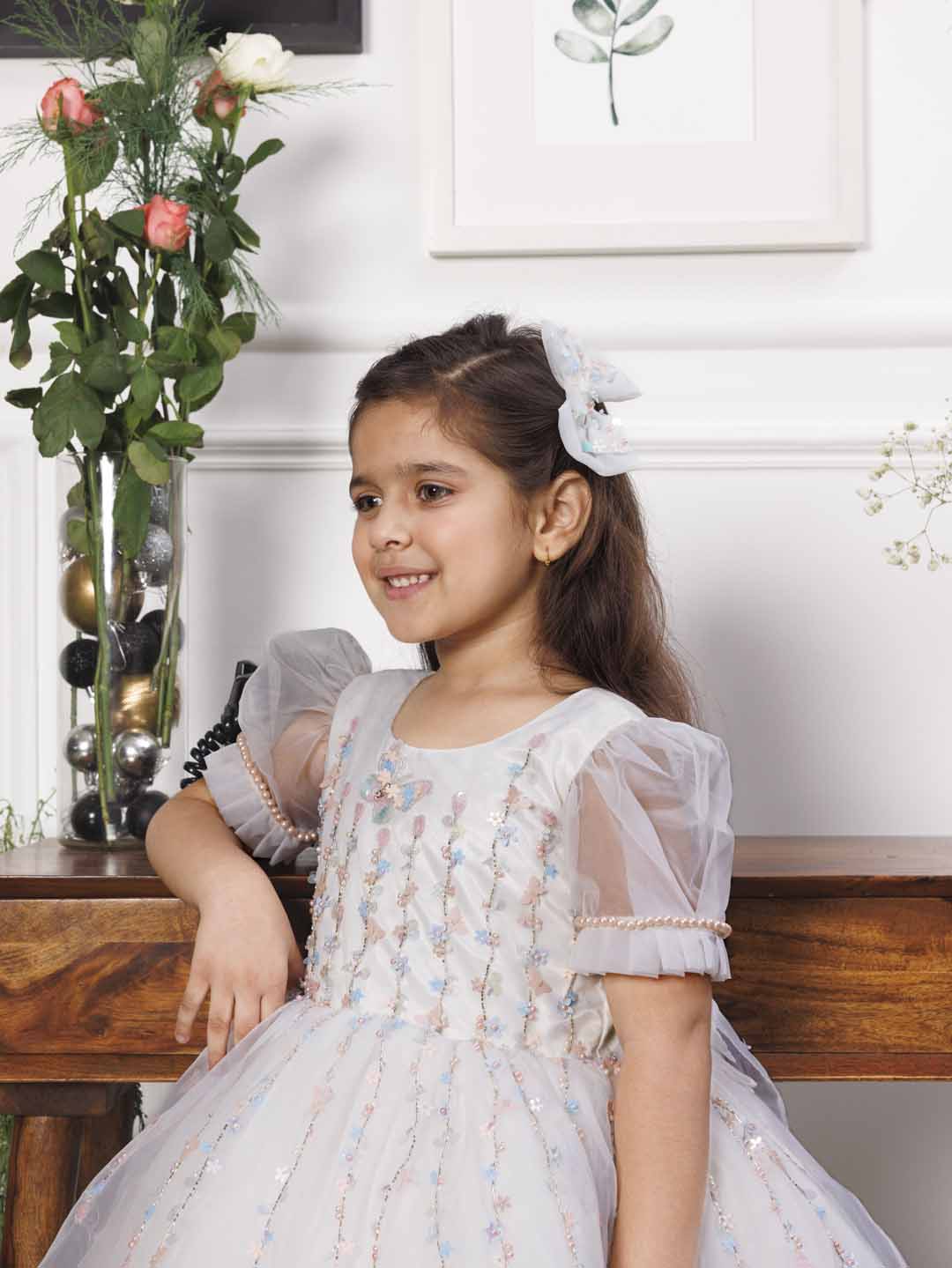 Phillipa white organza dress with hand embroidery of flower and butterflies detailing