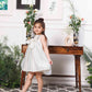 Emma white satin silk dress with bow in front