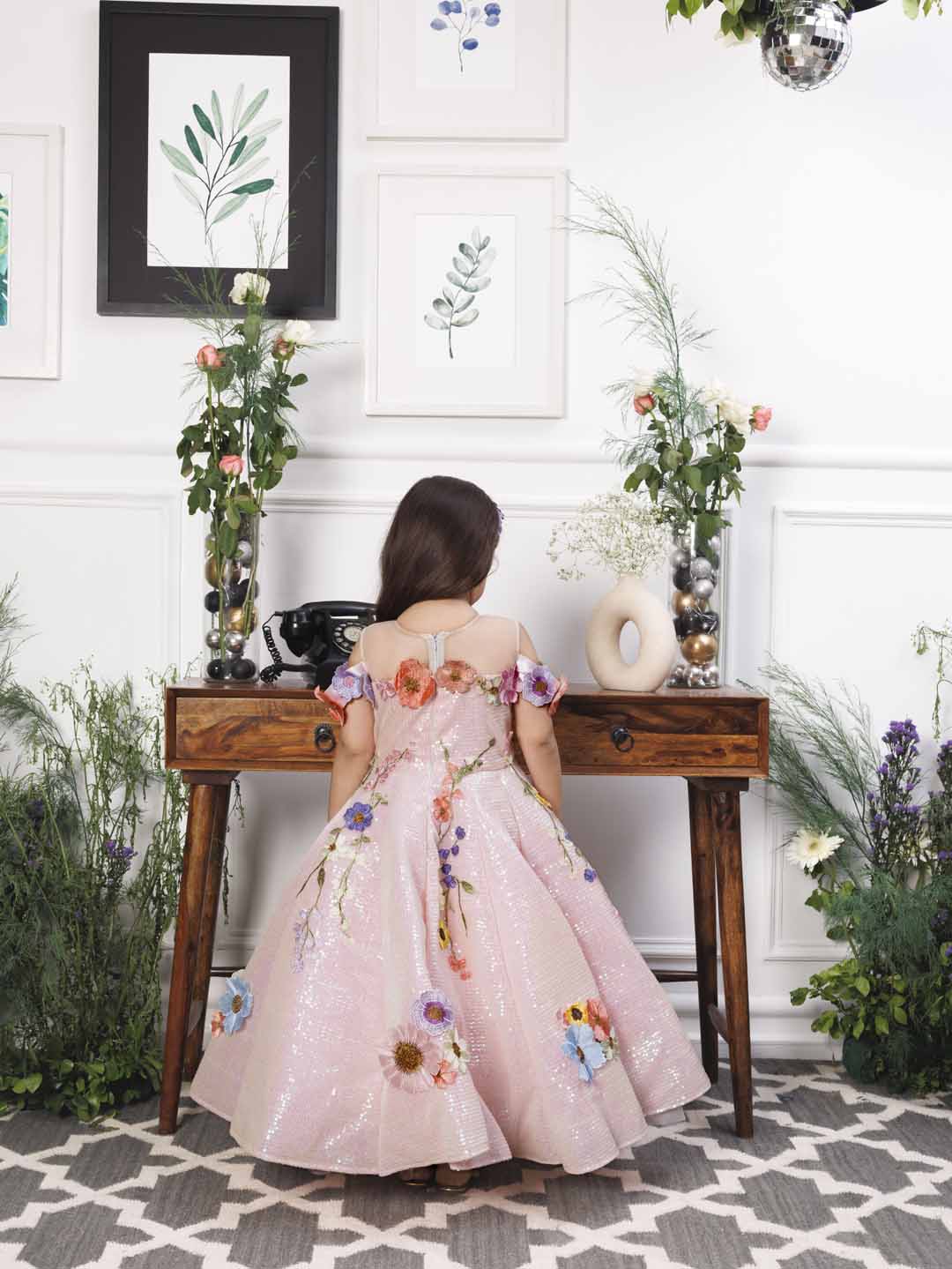 Lily pink sequin panel gown with flower detailing