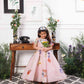 Lily pink sequin panel gown with flower detailing