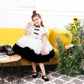 Risa the magical ruffled dress in black and white